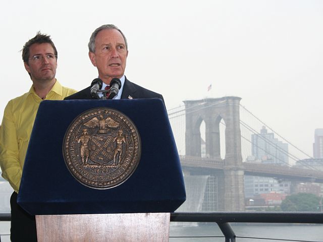 Mayor Bloomberg and artist Olafur Eliasson, with Brooklyn Bridge waterfalls to the right.